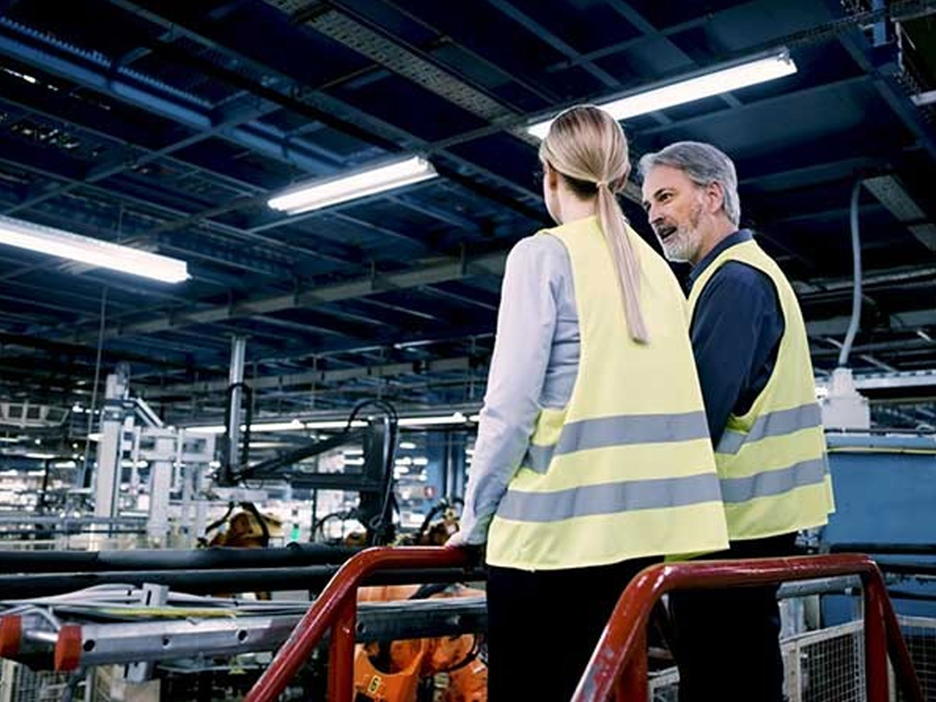 Couple of employees at a plant floor