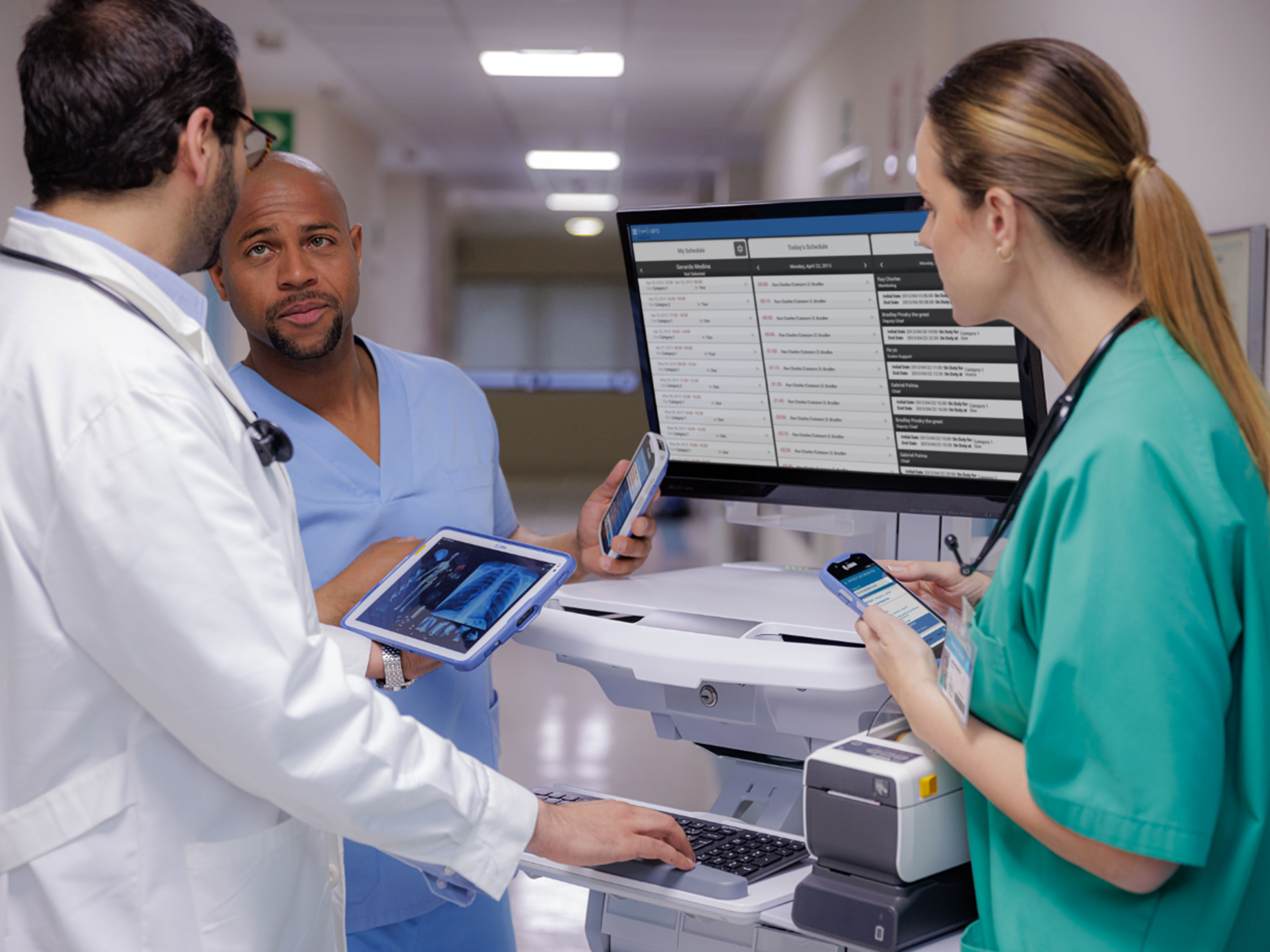 Hospital staff with Zebra's specialized handheld computers and tablets