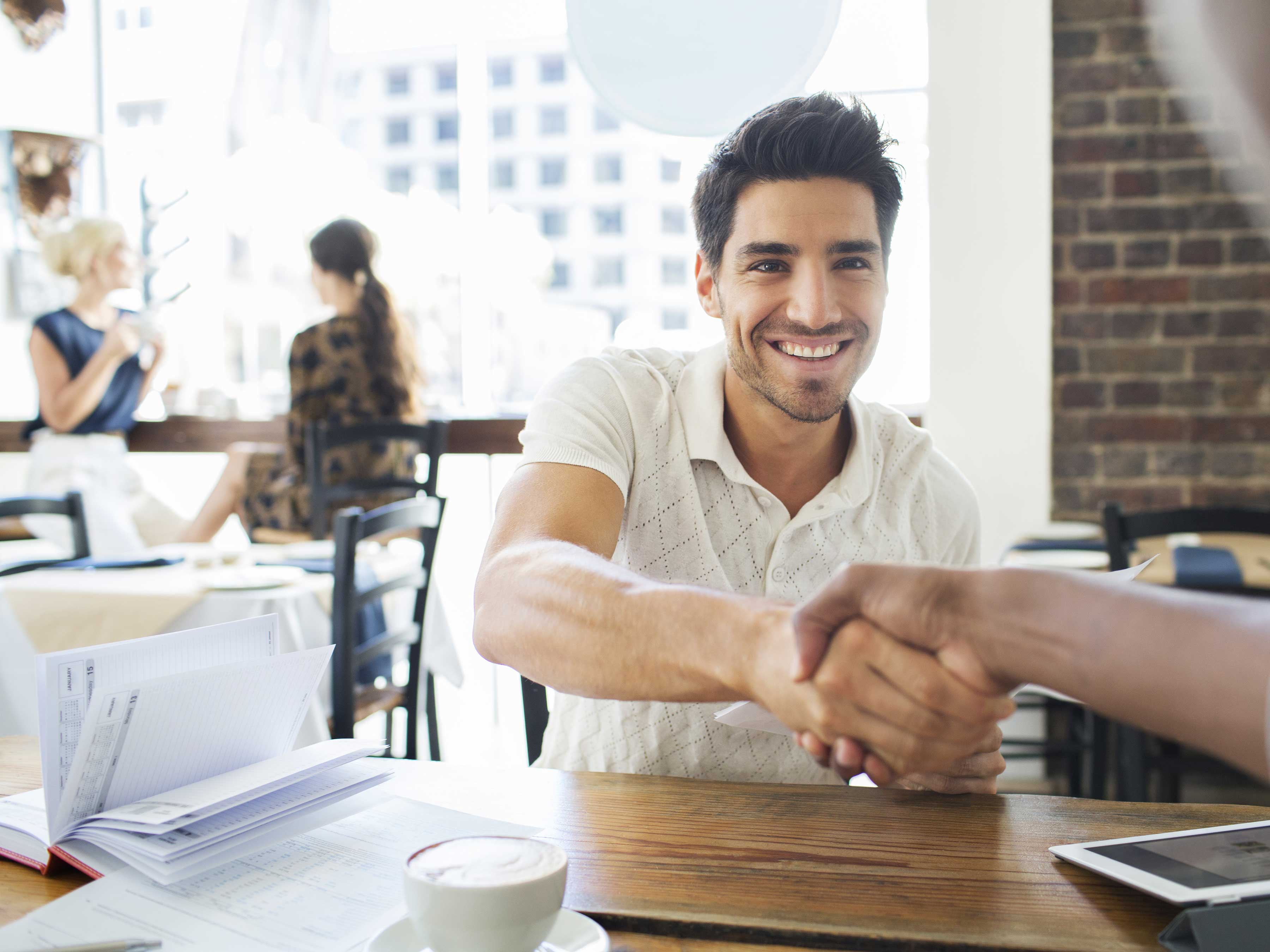 Two people shaking hands