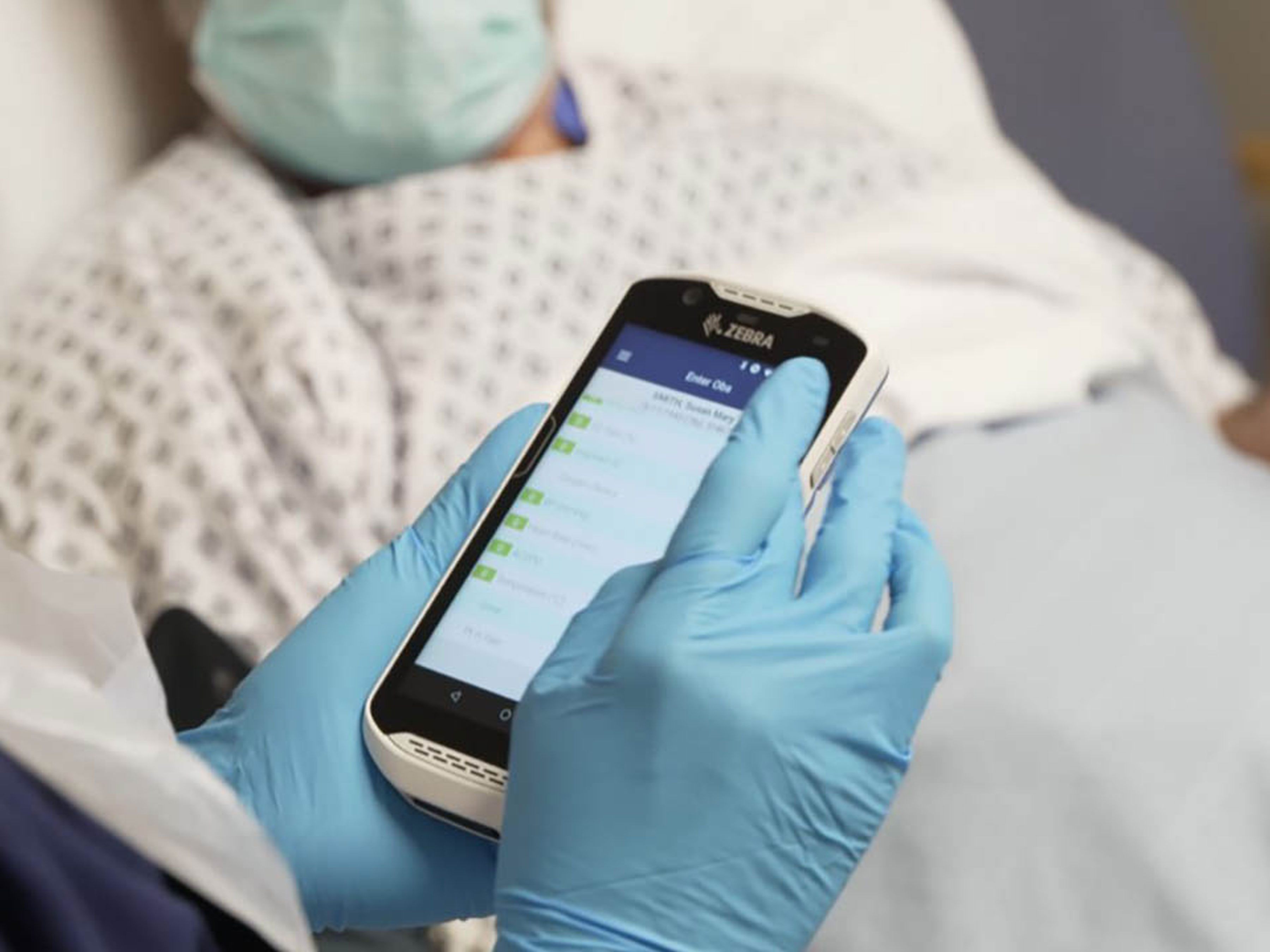 Nurse using Zebra's device