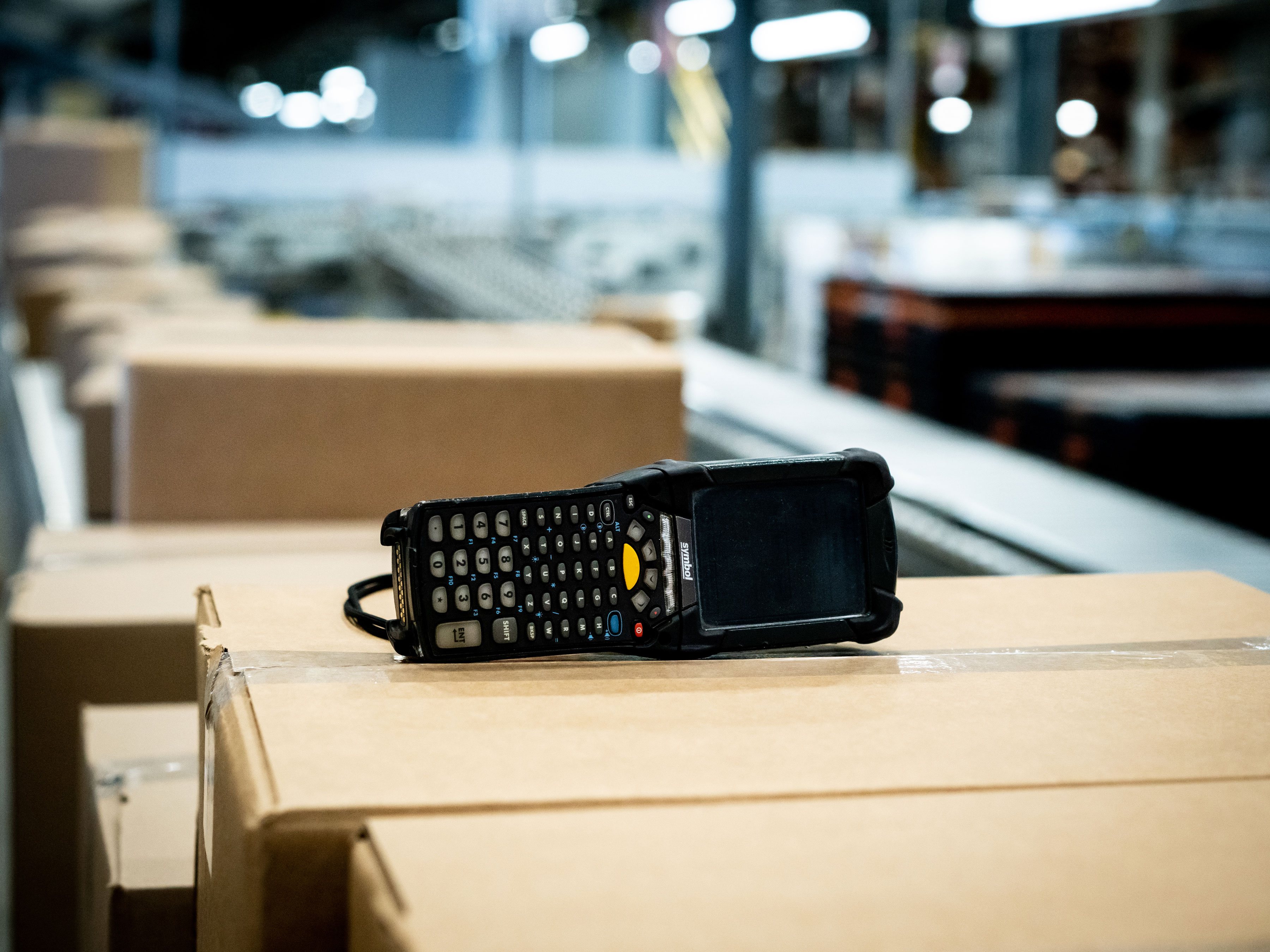 Zebra device on top of a package in a warehouse