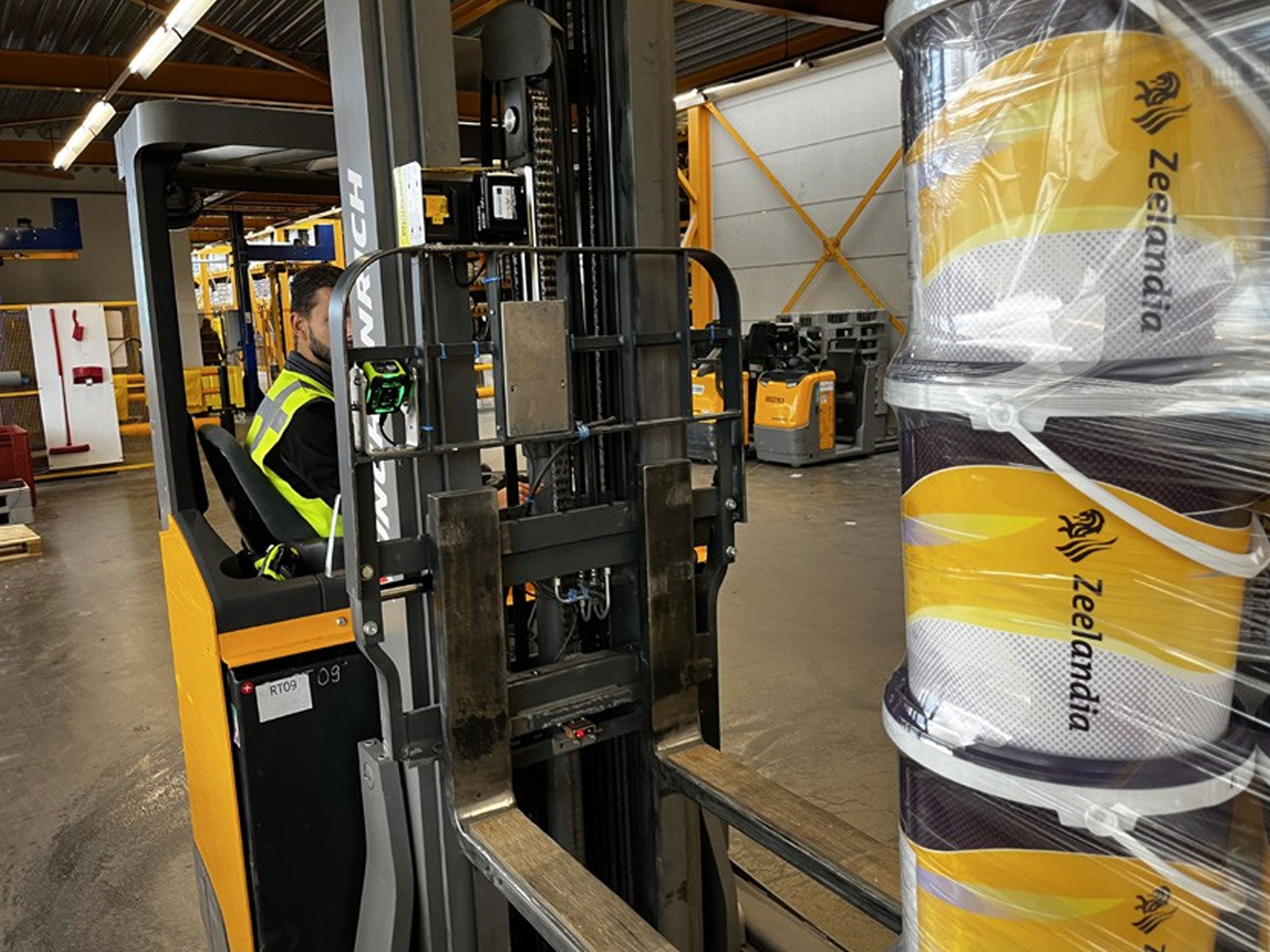 Worker in a warehouse using Zebra technology