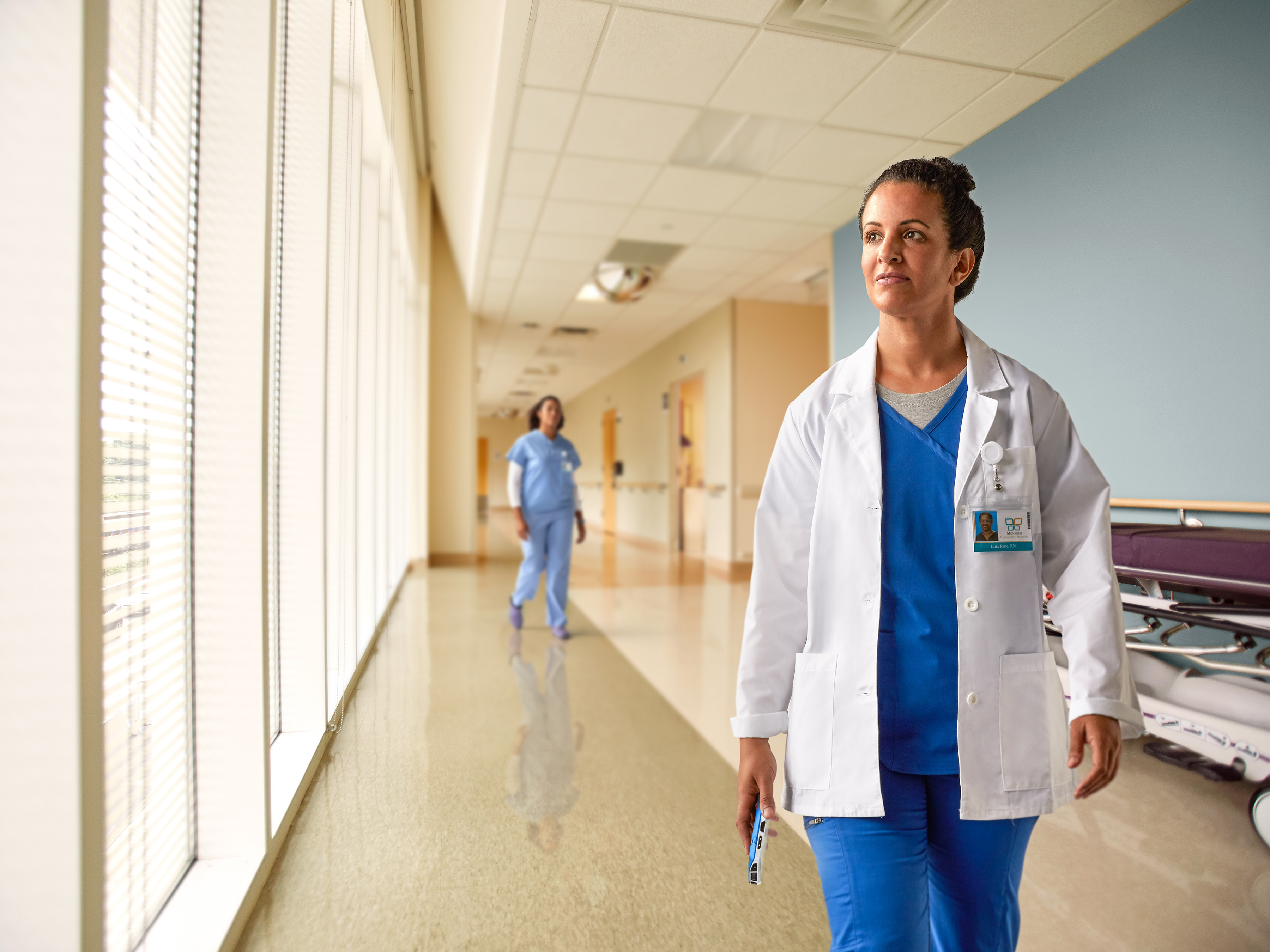 Healthcare Nurse in Hallway