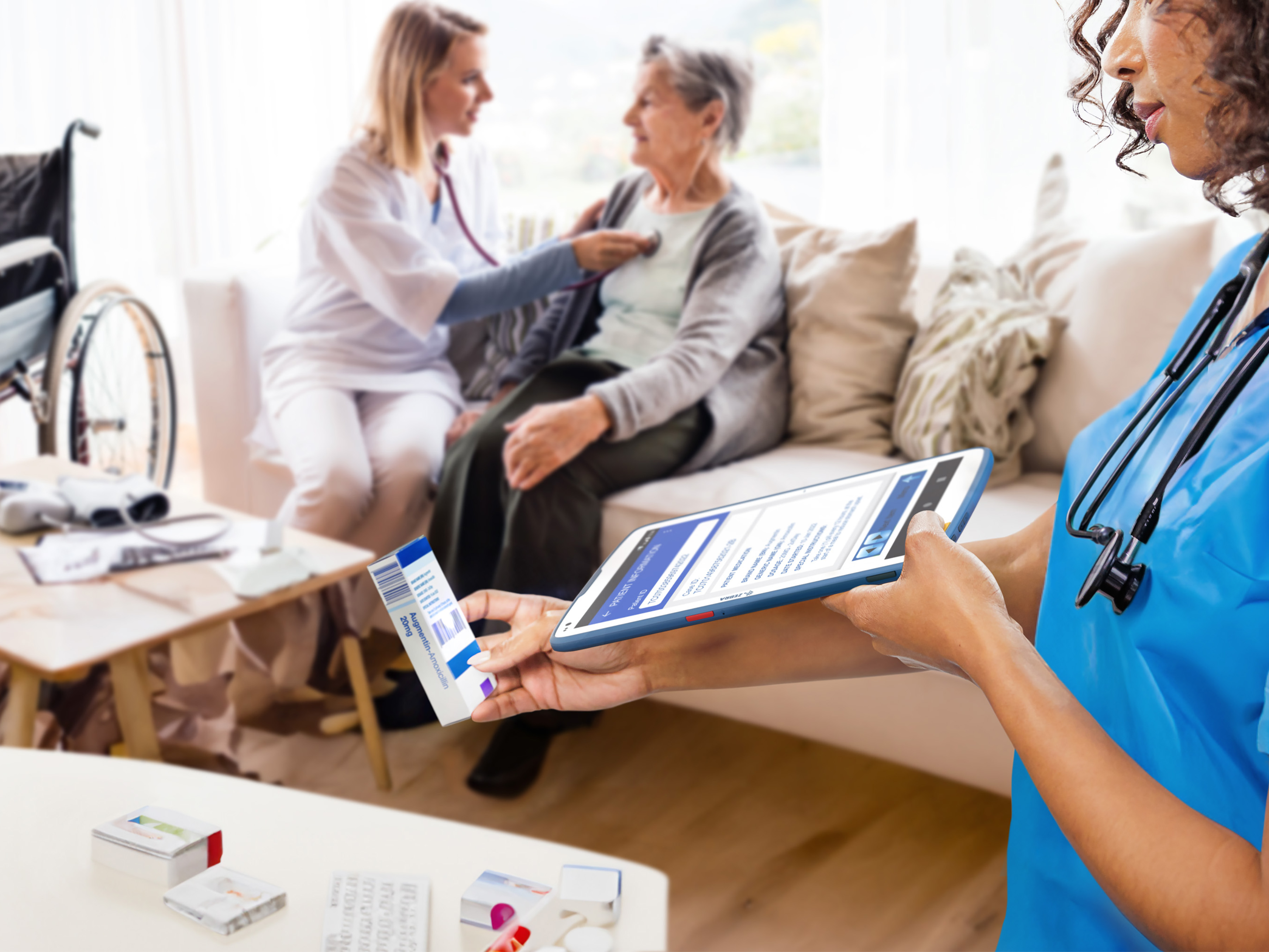 A home health nurse scans a patient's prescription using her Zebra tablet.